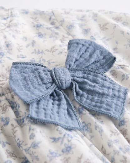 Newness · Pelele con estampado floral y gran lazo · Azul